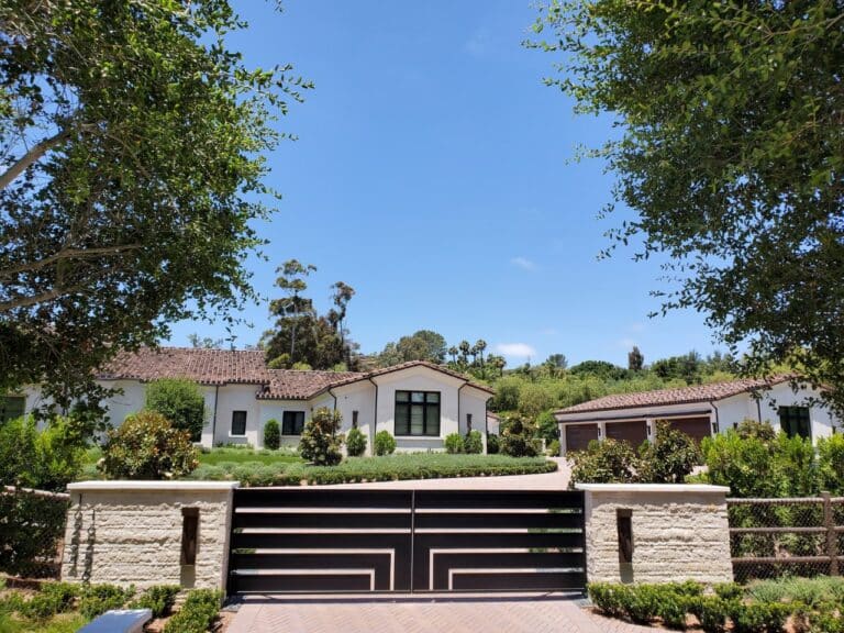 Custom Metal Gate with Wood Garage Doors